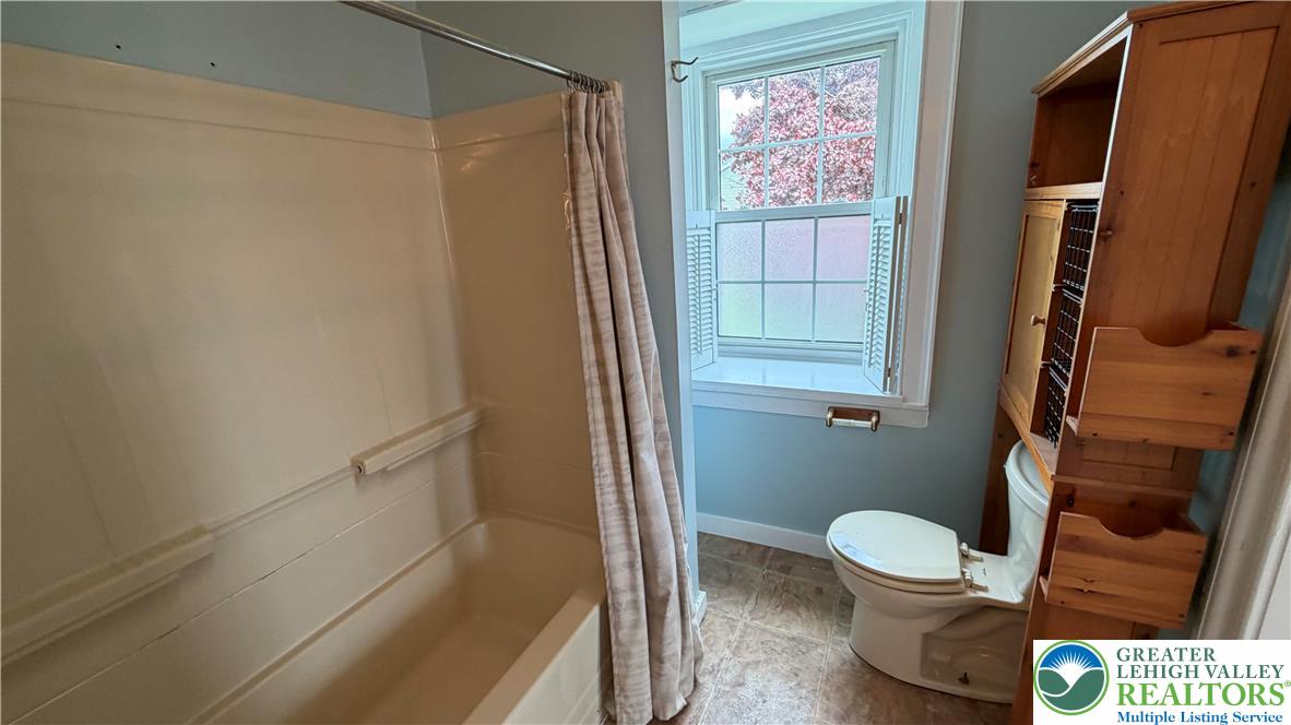 797 Main Street Tatamy, PA 18085 - Photo 13 of 41 a bathroom with a toilet and a shower