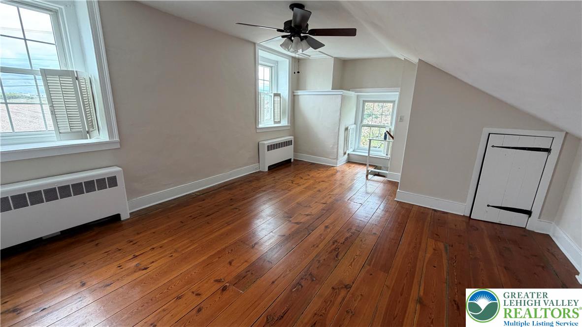 797 Main Street Tatamy, PA 18085 - Photo 20 of 41 wooden floor in an empty room with a window