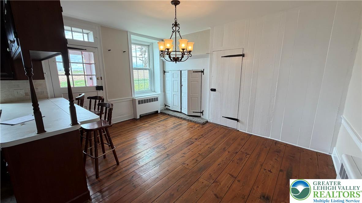 797 Main Street Tatamy, PA 18085 - Photo 39 of 41 a view of a room with wooden floor staircase and windows