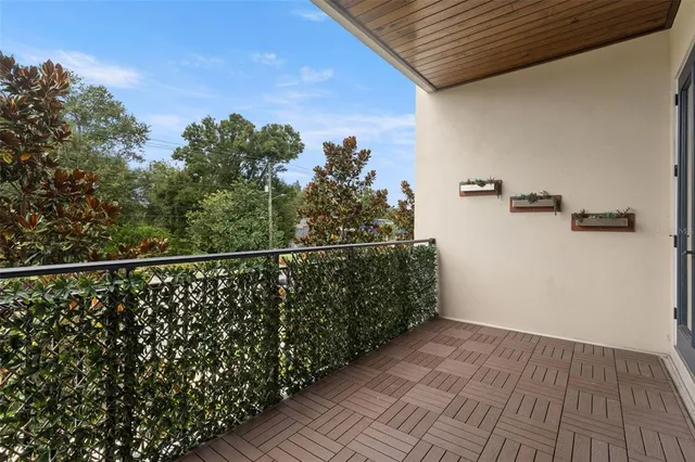 a view of a lake from a balcony