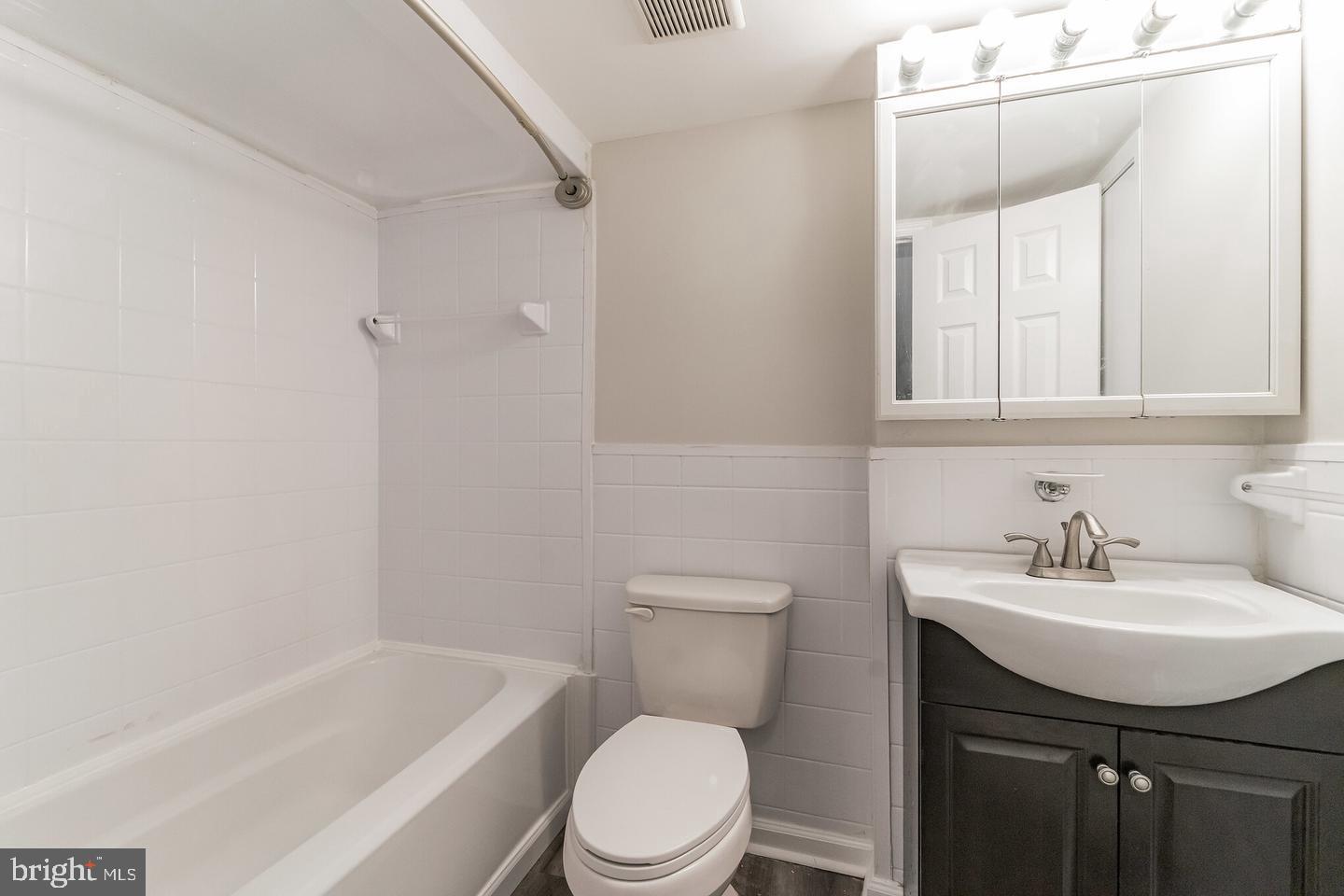 1865 Addison Road South District Heights, MD 20747 - Photo 12 of 13 Modern bathroom with sleek finishes.