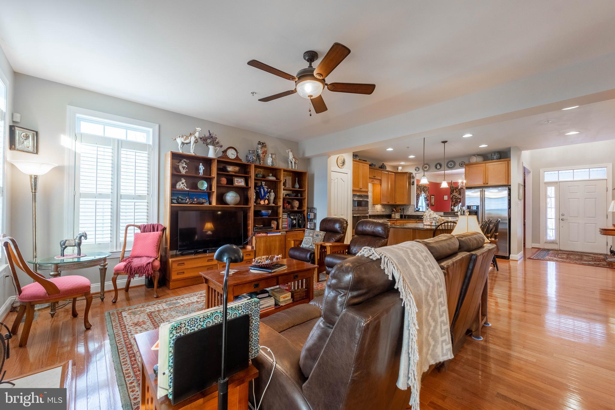 2611 Rockhampton Road Ellicott City, MD 21042 - Photo 15 of 61 Living-room open to kitchen has fan & gas FP