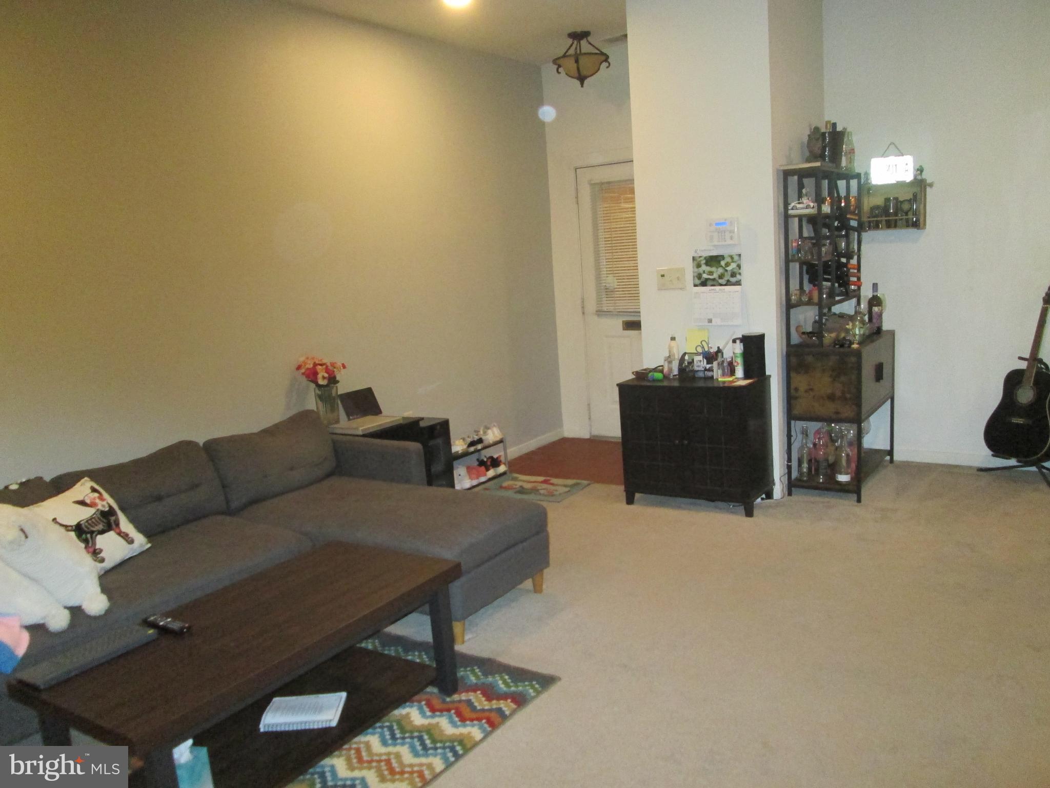 4 West Lee Street, Unit R63 Baltimore, MD 21201 - Photo 2 of 26 Spacious living room