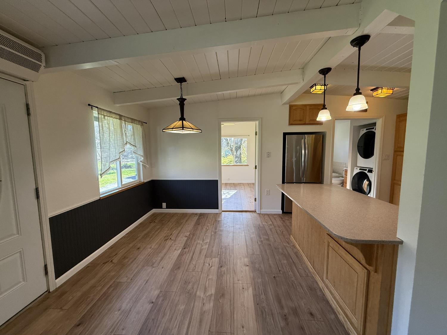 4881 Marshall Road Garden Valley, CA 95633 - Photo 12 of 25 a view of kitchen with furniture and a chandelier