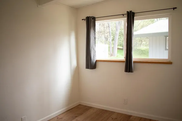an empty room with windows