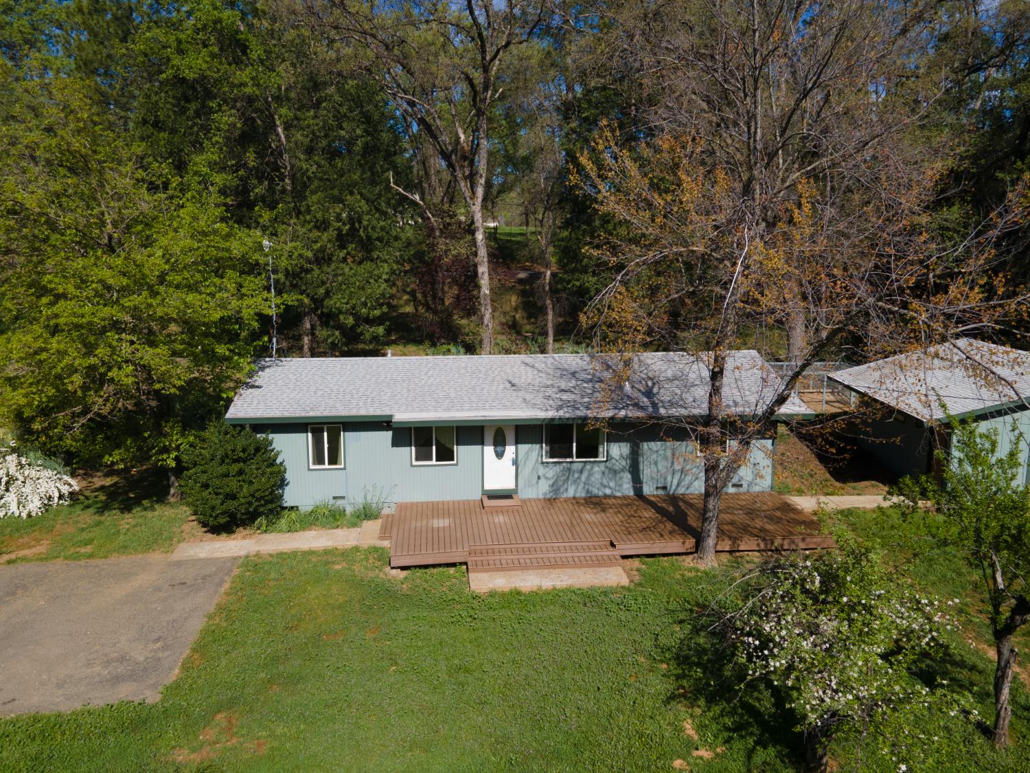 4881 Marshall Road Garden Valley, CA 95633 - Photo 19 of 25 a view of a house with backyard and sitting area