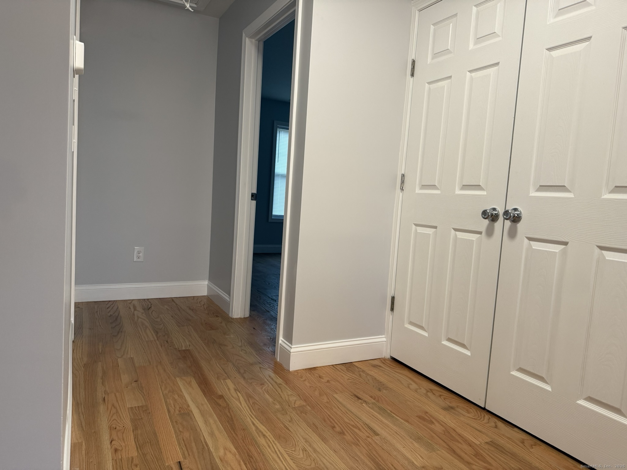 755 Hart Street Bridgeport, CT 06606 - Photo 19 of 37 a view of an empty room with wooden floor