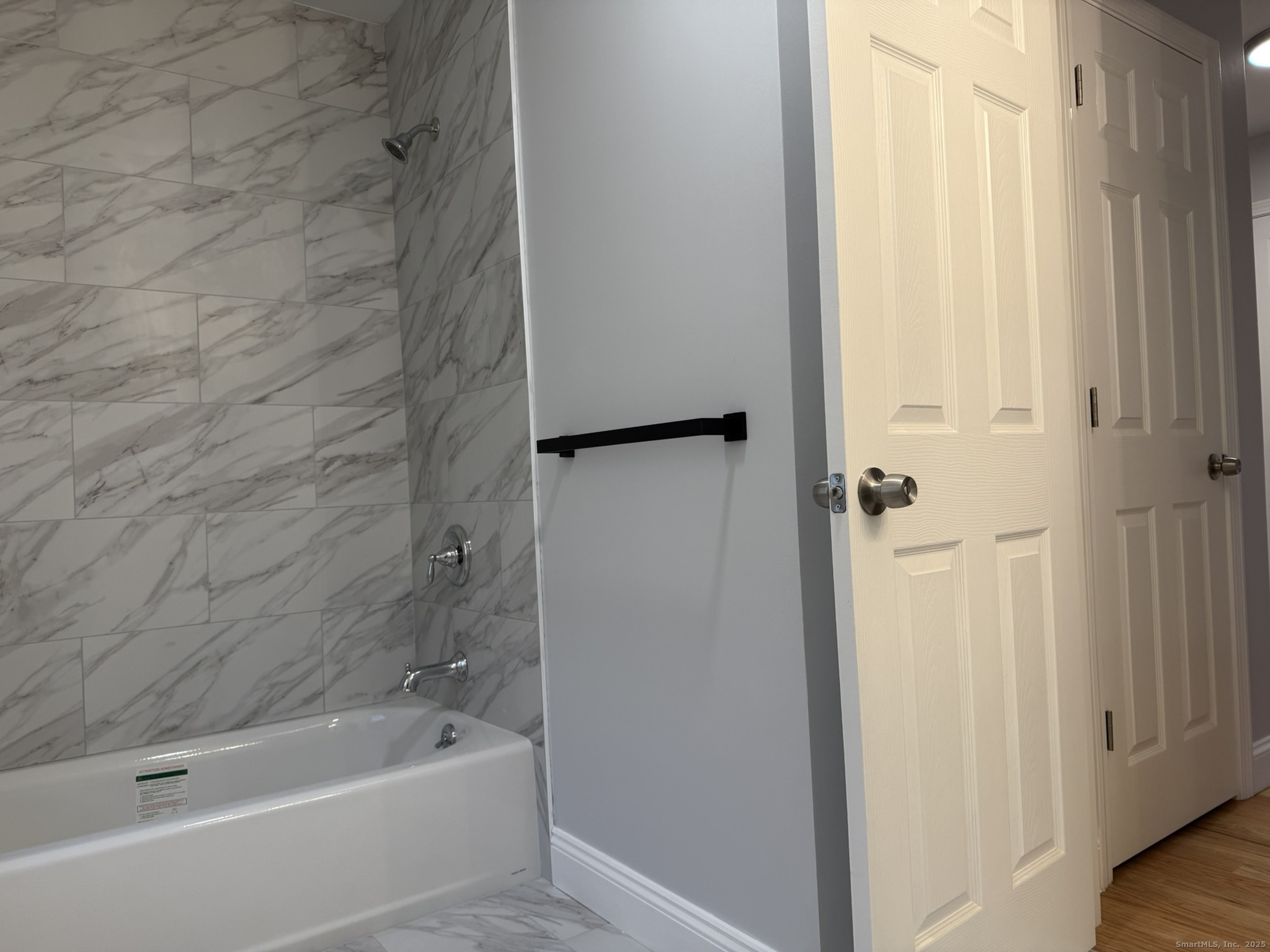 755 Hart Street Bridgeport, CT 06606 - Photo 3 of 37 a bathroom with a bathtub