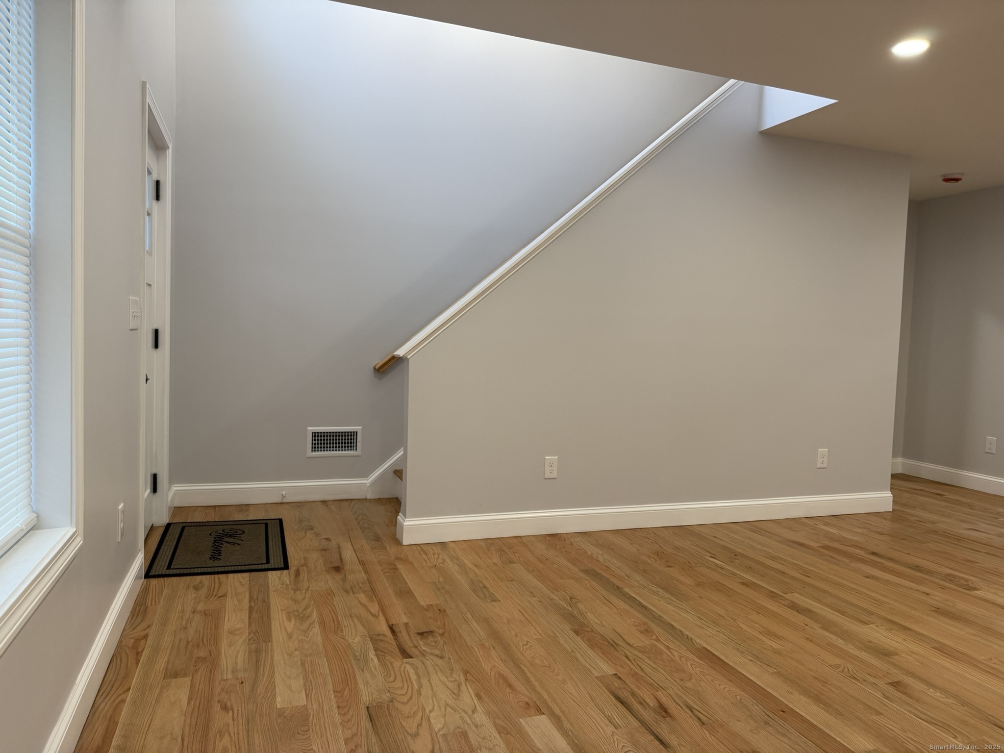 755 Hart Street Bridgeport, CT 06606 - Photo 31 of 37 a view of a room with wooden floor