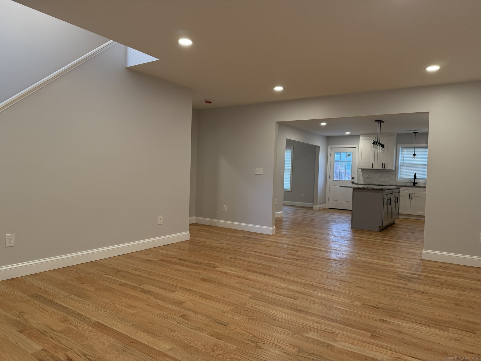 755 Hart Street Bridgeport, CT 06606 - Photo 36 of 37 a view of kitchen and hall with wooden floor