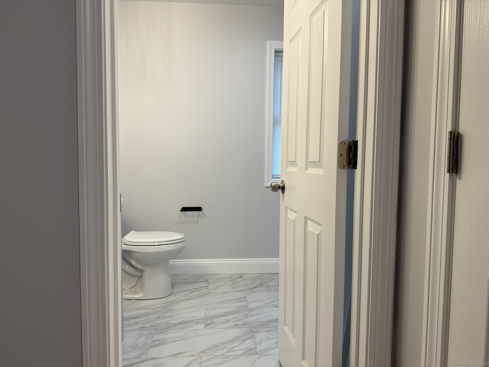 755 Hart Street Bridgeport, CT 06606 - Photo 5 of 37 a bathroom with a toilet