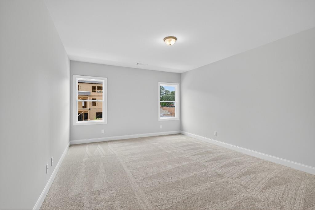 5649 Ernest Way Flowery Branch, GA 30542 - Photo 38 of 69 a view of an empty room with a window