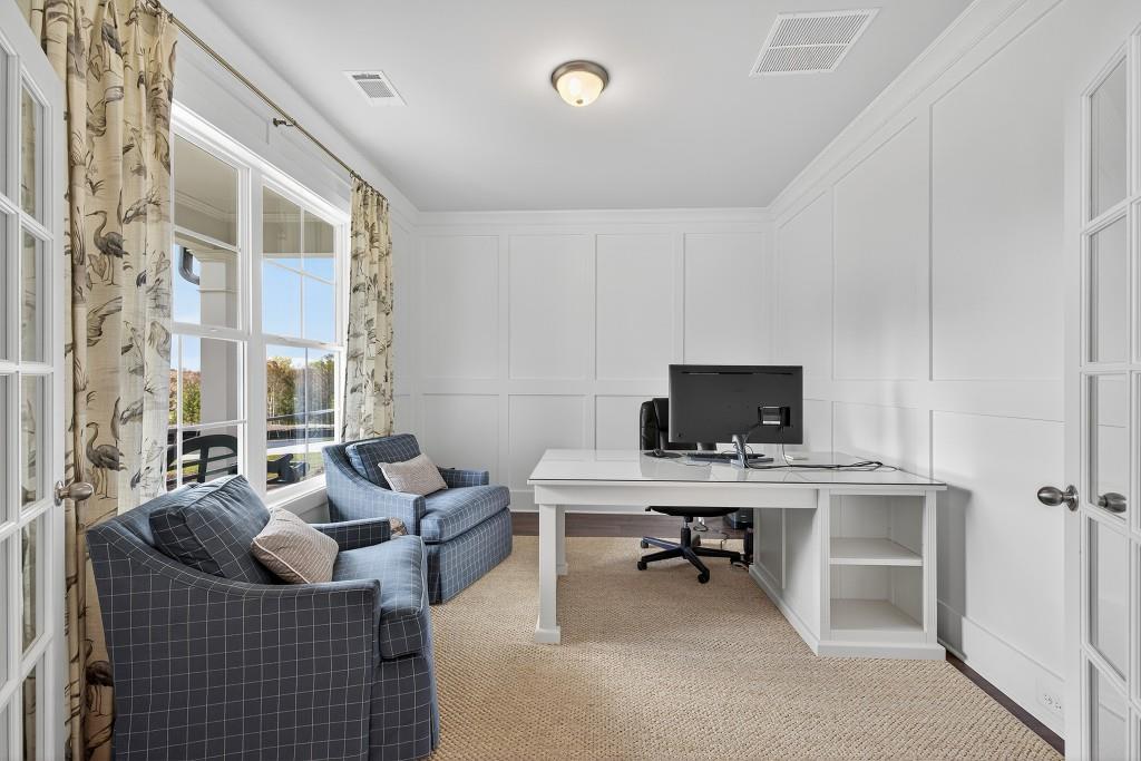 5649 Ernest Way Flowery Branch, GA 30542 - Photo 7 of 69 a living room with furniture and a flat screen tv
