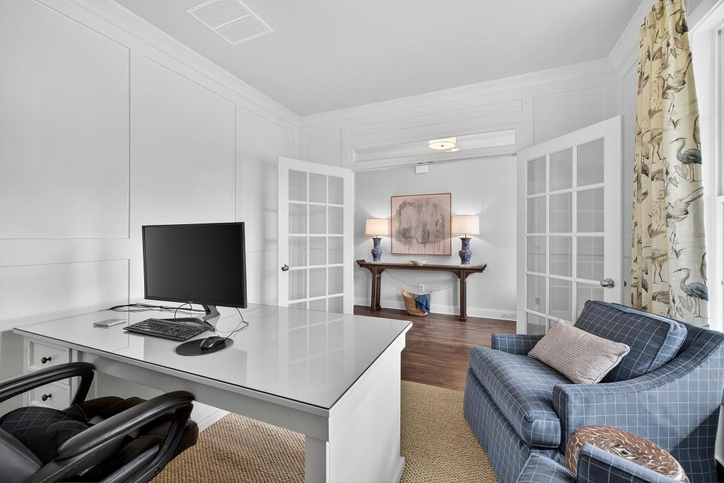 5649 Ernest Way Flowery Branch, GA 30542 - Photo 8 of 69 a living room with furniture and a flat screen tv