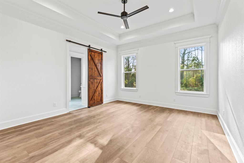 12171 Copper Court Tyler, TX 75706 - Photo 21 of 40 a view of an empty room with a window