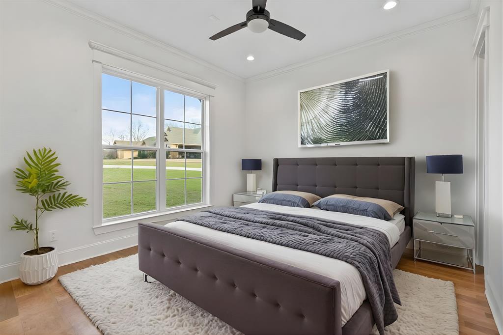 12171 Copper Court Tyler, TX 75706 - Photo 31 of 40 a bedroom with a large bed and a window