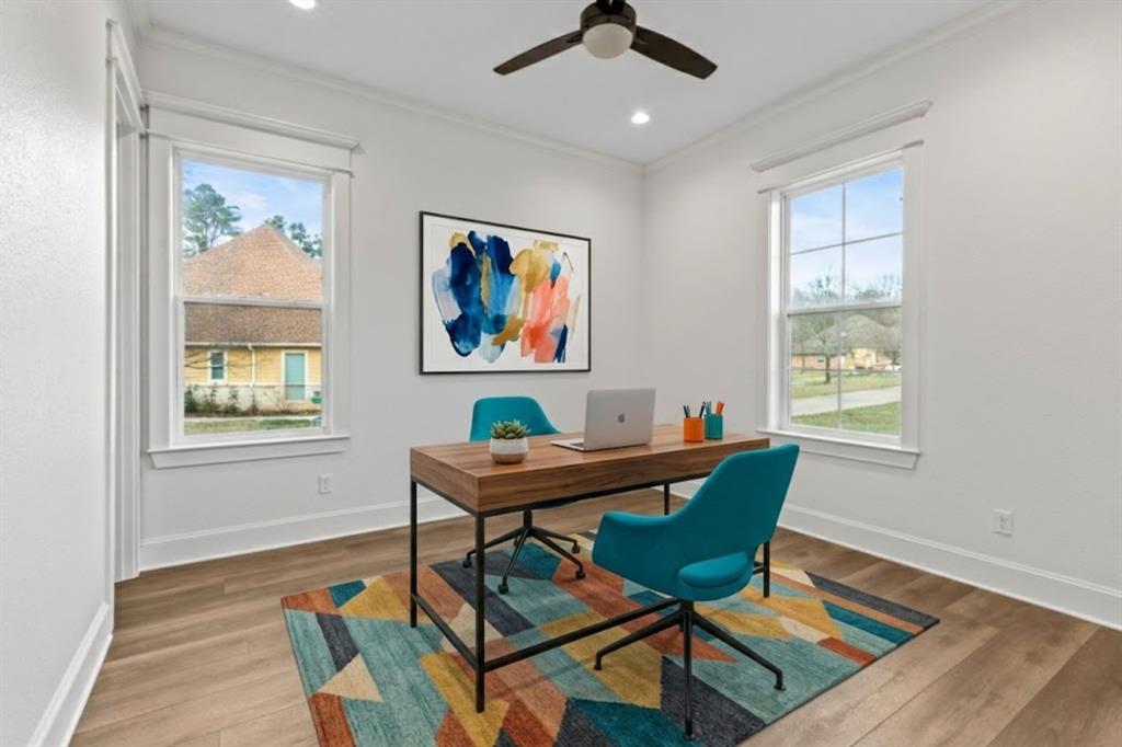 12171 Copper Court Tyler, TX 75706 - Photo 33 of 40 a workspace with wooden floor and windows