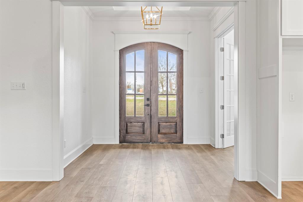 12171 Copper Court Tyler, TX 75706 - Photo 7 of 40 an empty room with entrance door