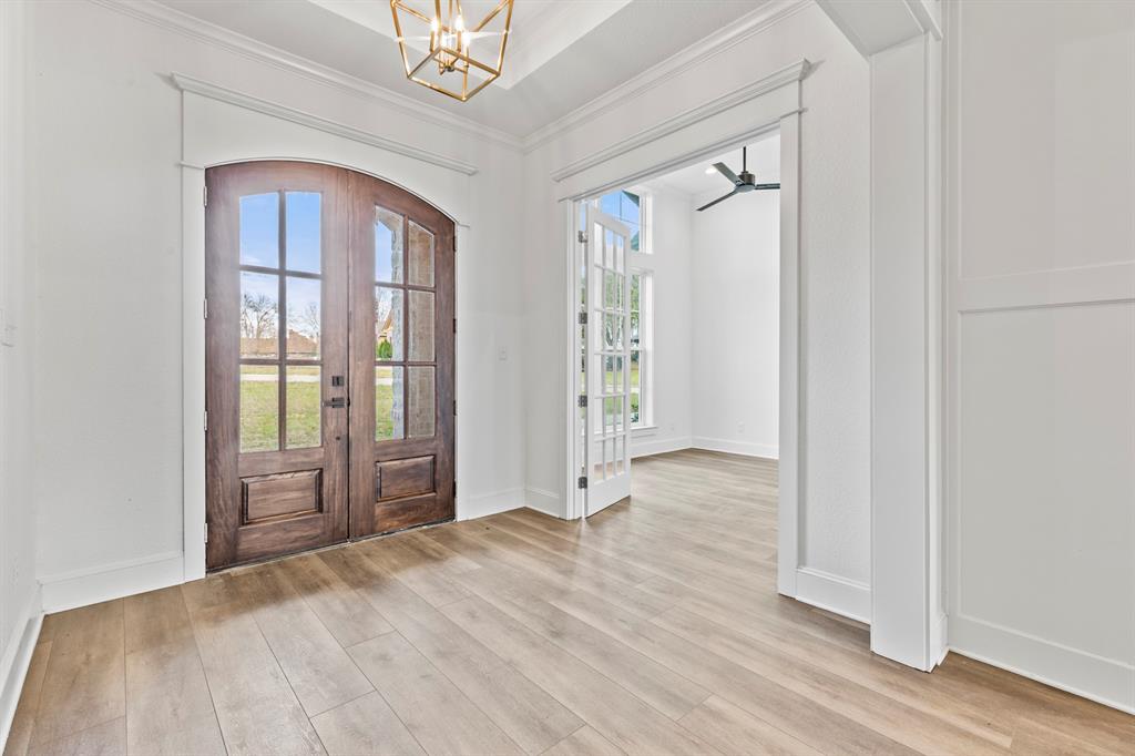 12171 Copper Court Tyler, TX 75706 - Photo 8 of 40 a view of empty room with wooden floor and fan