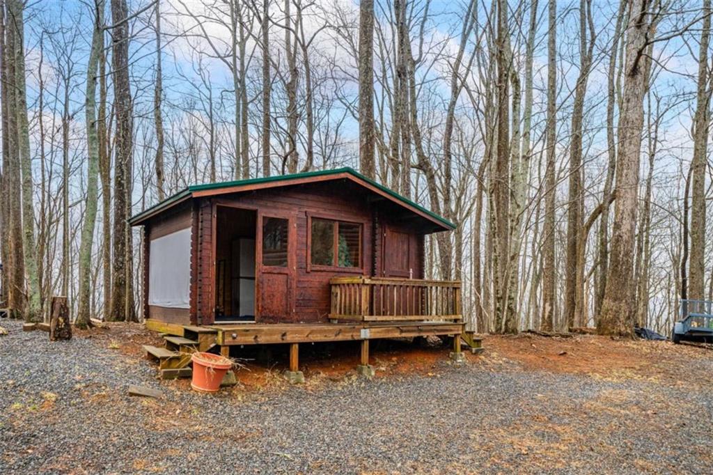 541 Little Bushy Head Road Blue Ridge, GA 30513 - Photo 43 of 43 a backyard of a house with outdoor seating