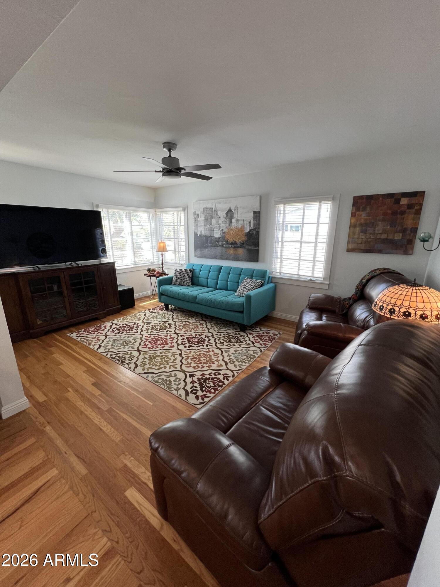 1326 East Coronado Road Phoenix, AZ 85006 - Photo 5 of 36 a living room with furniture a rug and a window