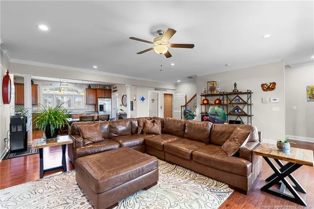 a white toilet sitting next to a bathroom sink