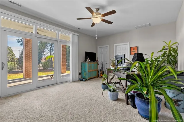 a view of a workspace with furniture