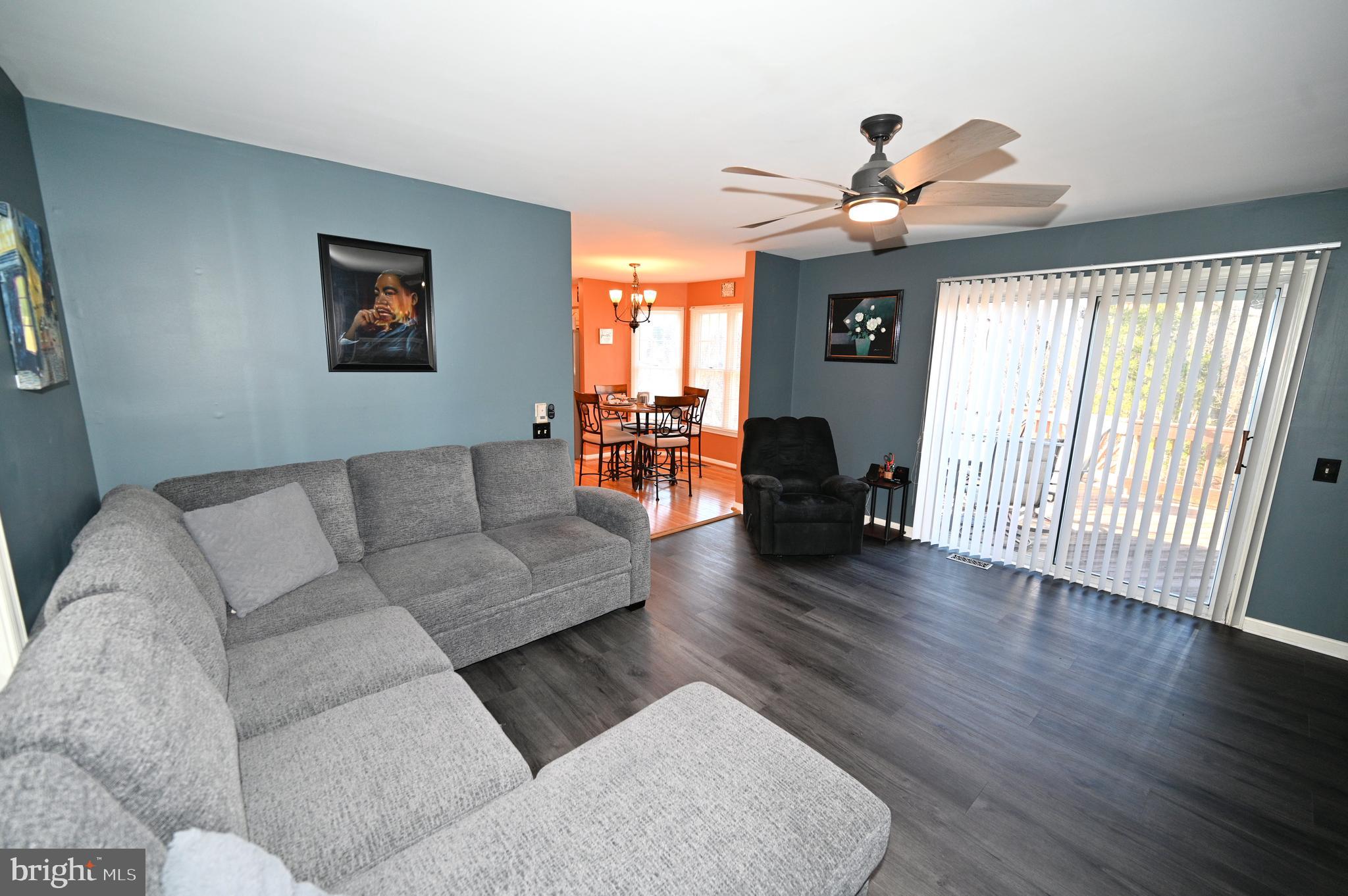 7729 Castle Rock Drive Clinton, MD 20735 - Photo 14 of 65 a living room with furniture and wooden floor