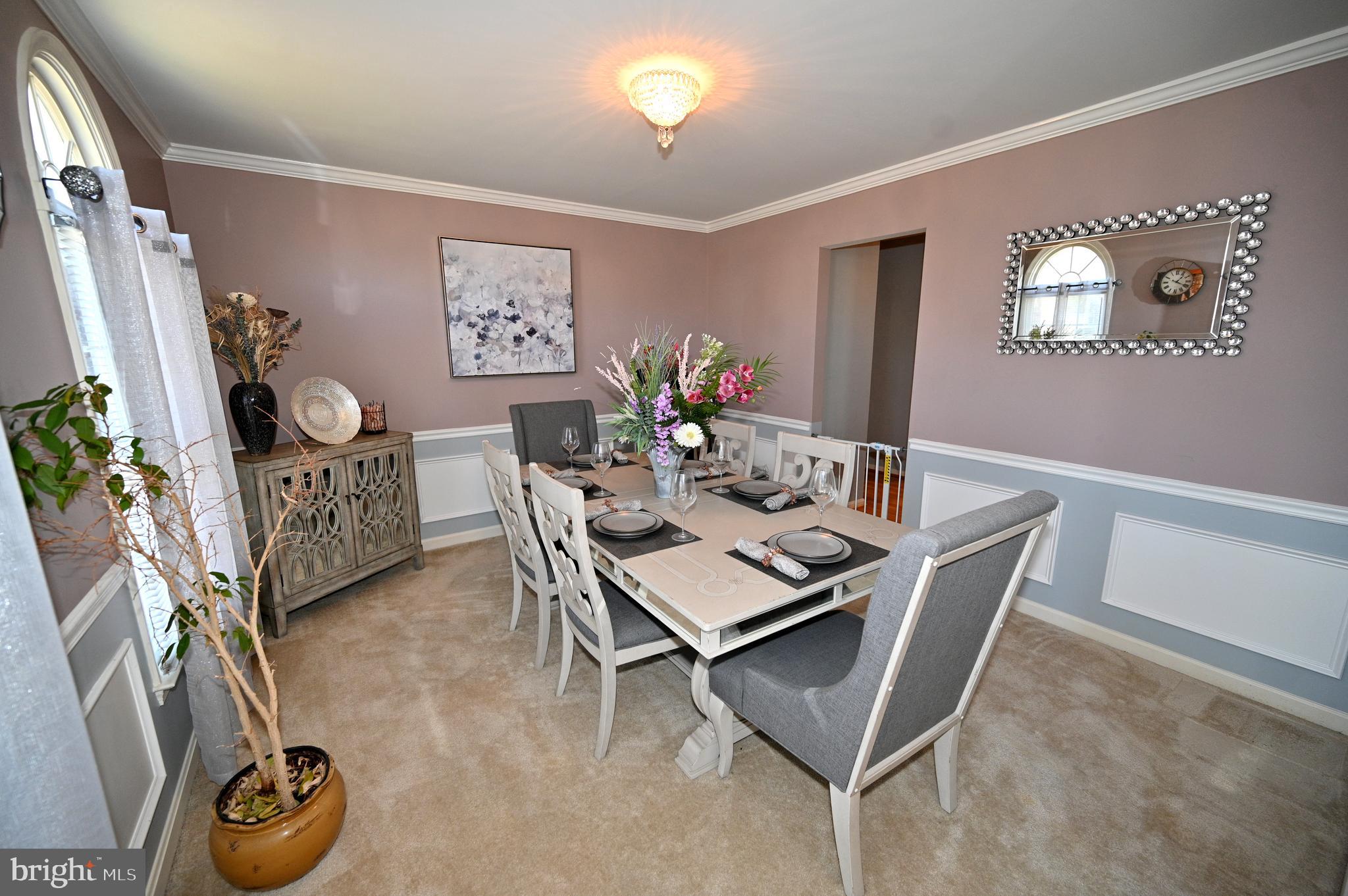 7729 Castle Rock Drive Clinton, MD 20735 - Photo 19 of 65 a view of a dining room with furniture
