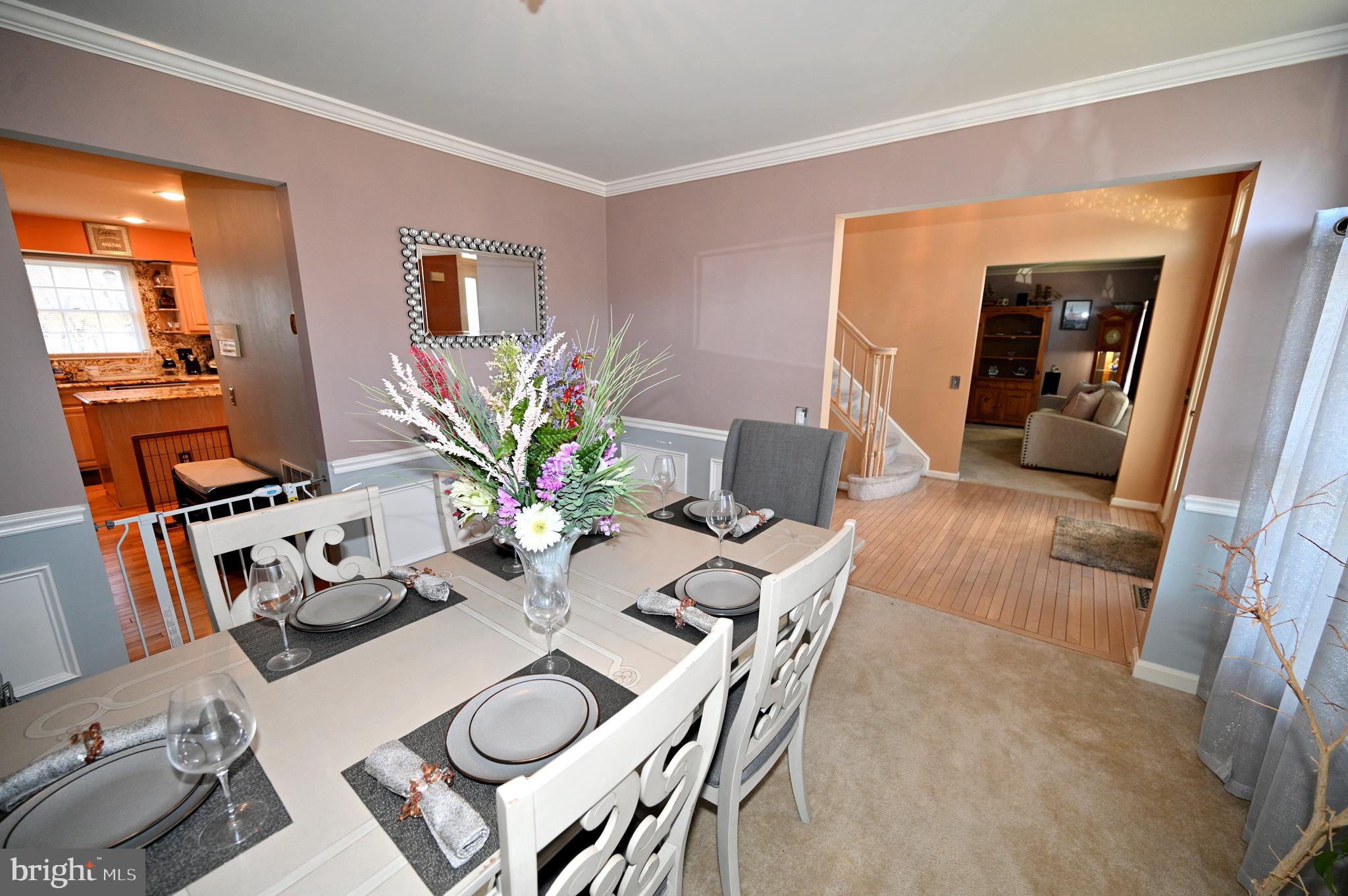 7729 Castle Rock Drive Clinton, MD 20735 - Photo 20 of 65 a dining room with furniture and wooden floor