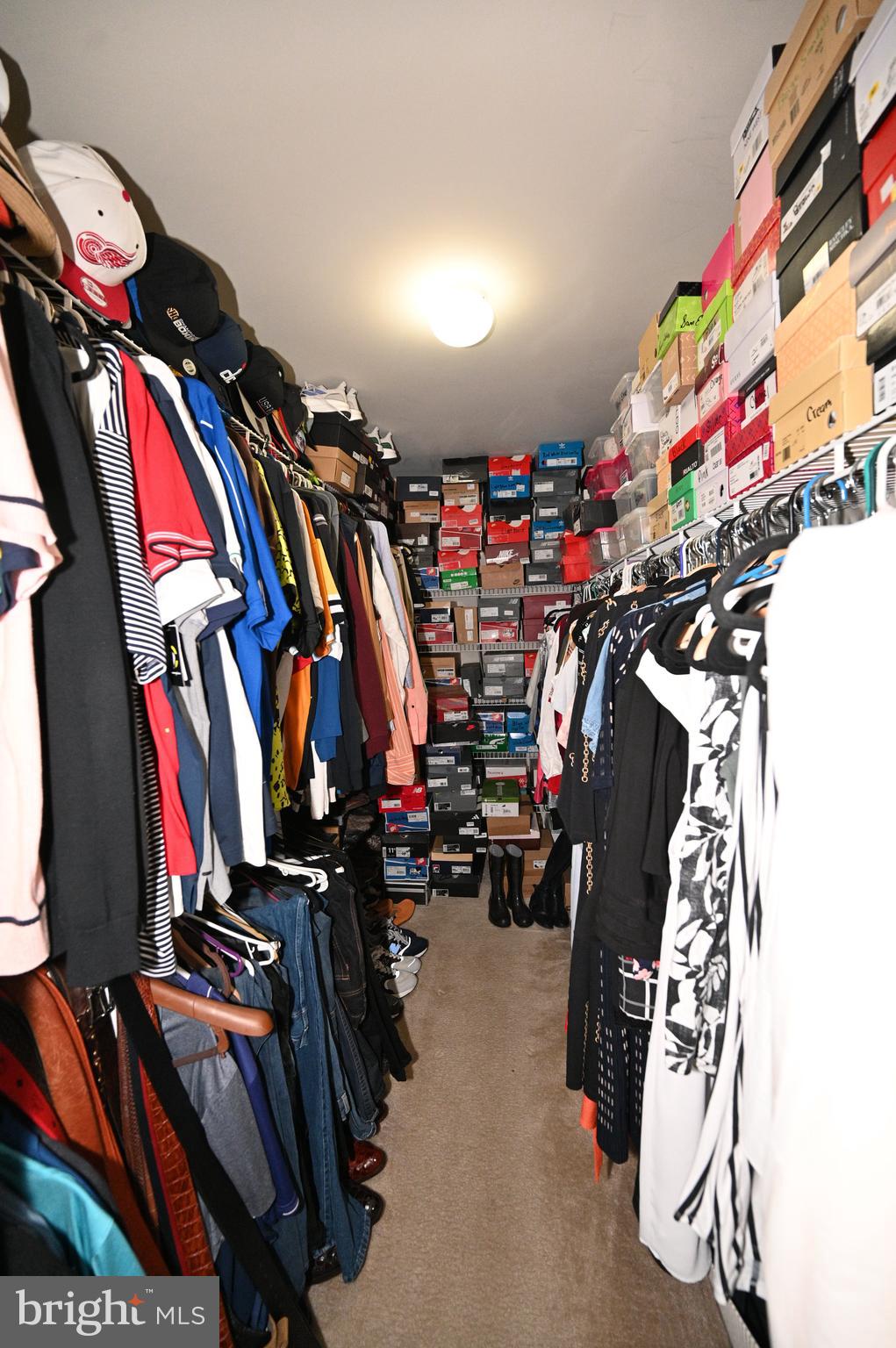 7729 Castle Rock Drive Clinton, MD 20735 - Photo 29 of 65 a view of walk in closet with clothes