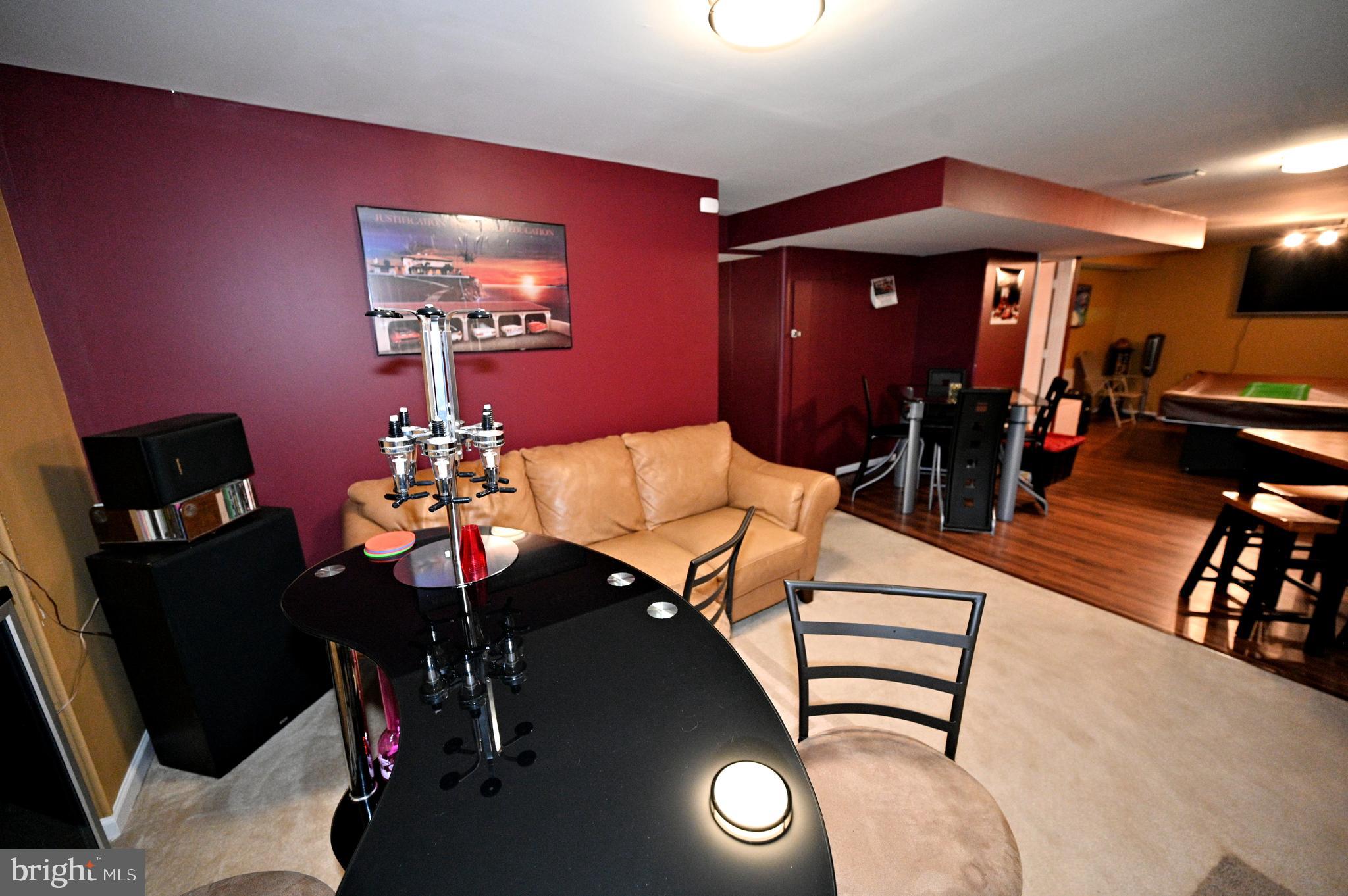 7729 Castle Rock Drive Clinton, MD 20735 - Photo 45 of 65 a view of a dining room with furniture and chandelier