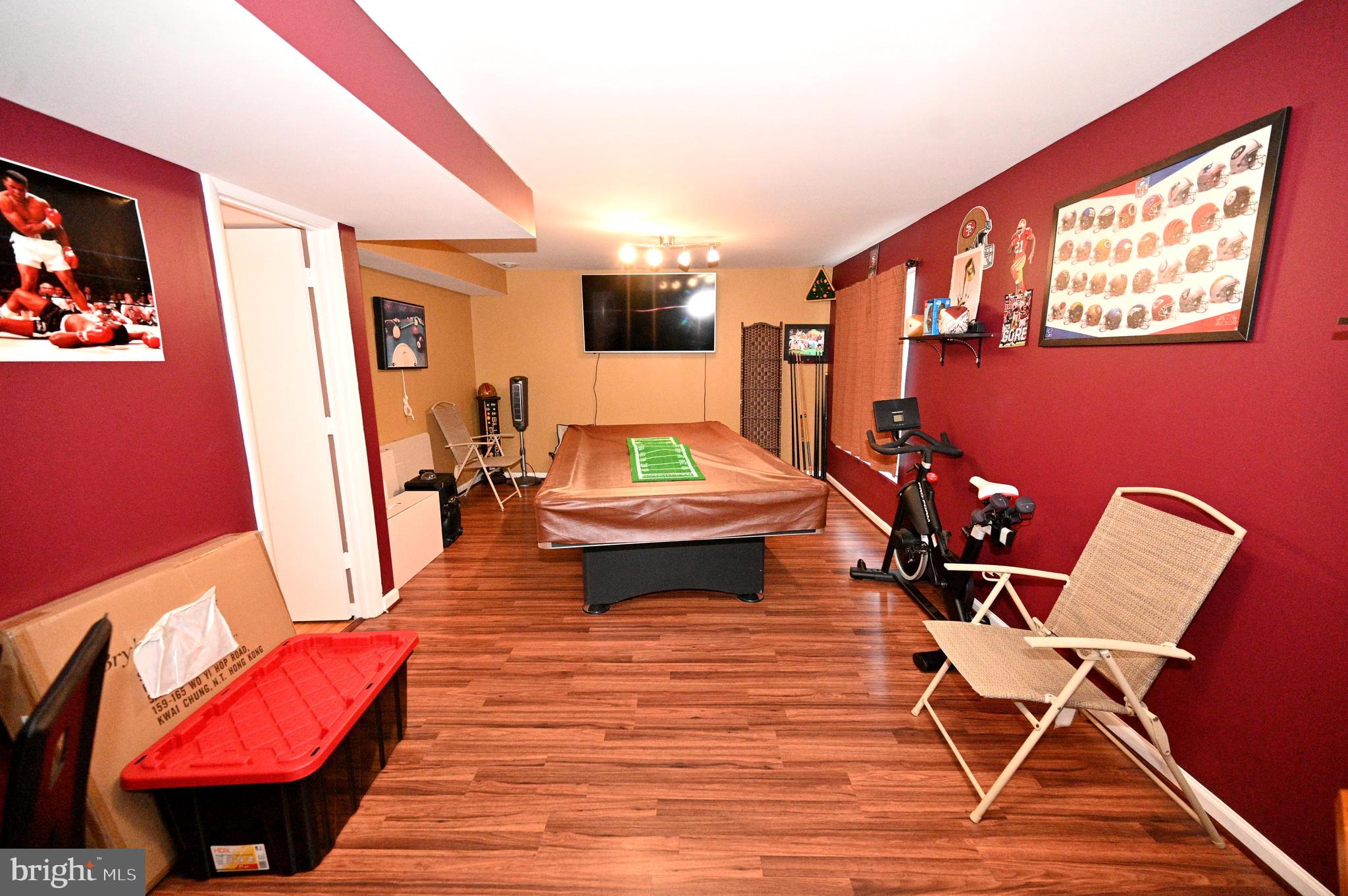 7729 Castle Rock Drive Clinton, MD 20735 - Photo 50 of 65 a living room with furniture and a wooden floor