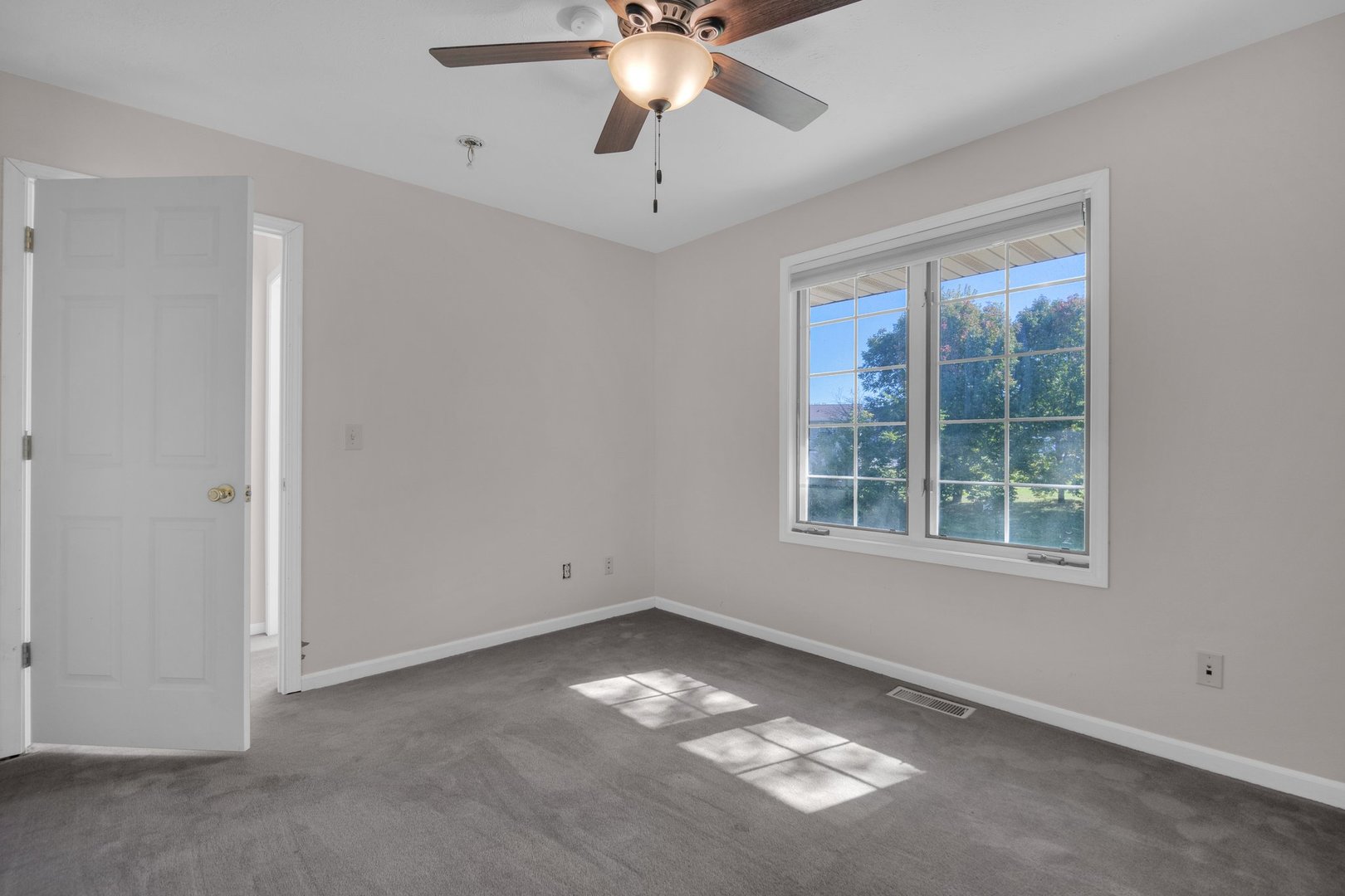 112 Sequoyah Court Southwest Poplar Grove, IL 61065 - Photo 20 of 26 a view of an empty room with a window