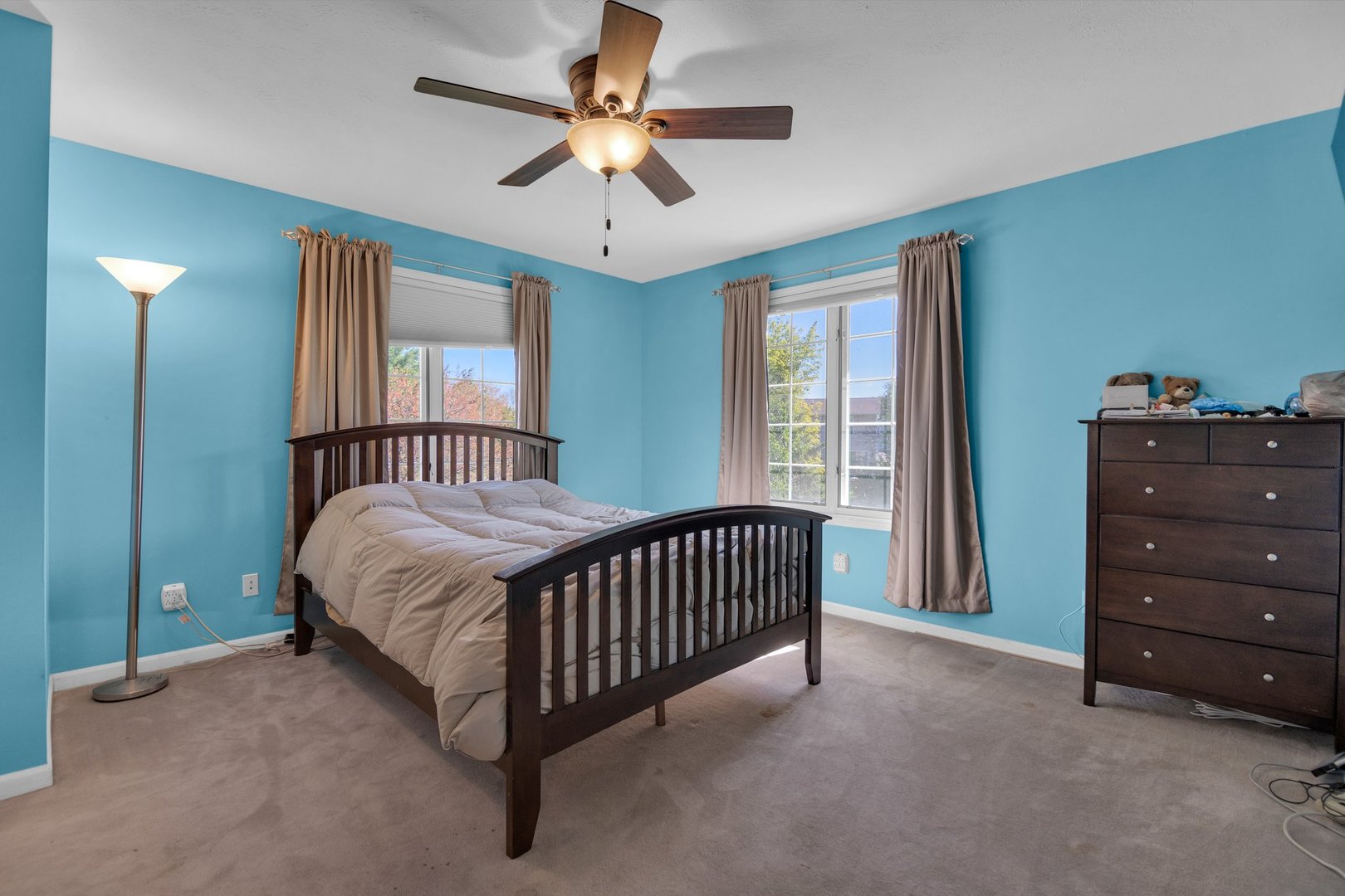 112 Sequoyah Court Southwest Poplar Grove, IL 61065 - Photo 22 of 26 a spacious bedroom with a bed and a chandelier