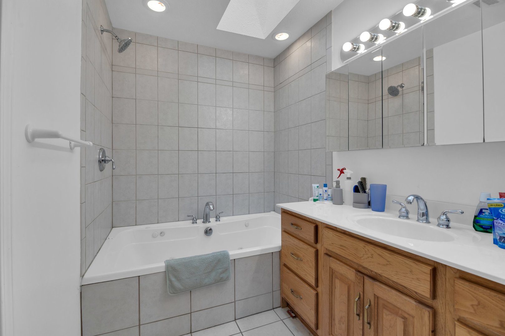 112 Sequoyah Court Southwest Poplar Grove, IL 61065 - Photo 24 of 26 a bathroom with a sink double vanity and shower