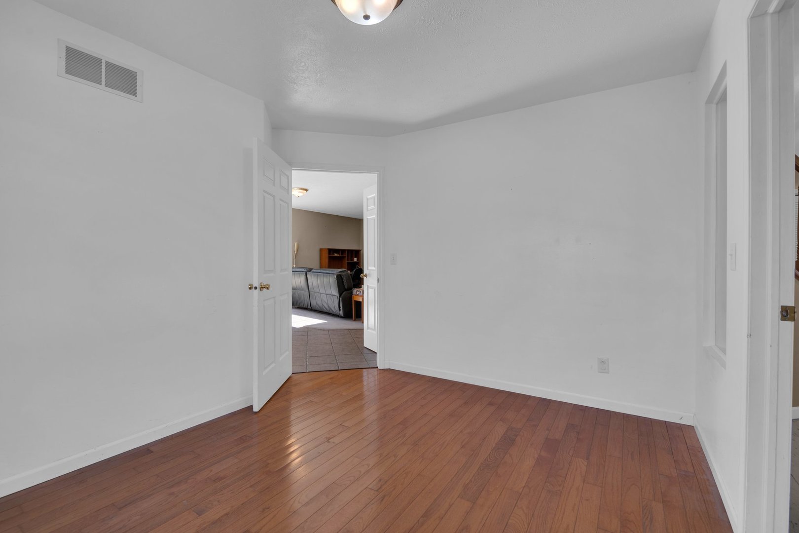 112 Sequoyah Court Southwest Poplar Grove, IL 61065 - Photo 5 of 26 a view of a kitchen with wooden floor and a sink