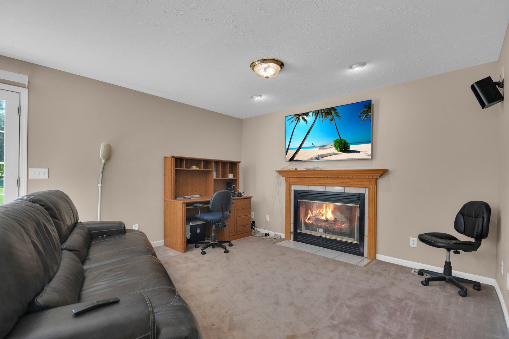 112 Sequoyah Court Southwest Poplar Grove, IL 61065 - Photo 8 of 26 a living room with furniture and a fireplace