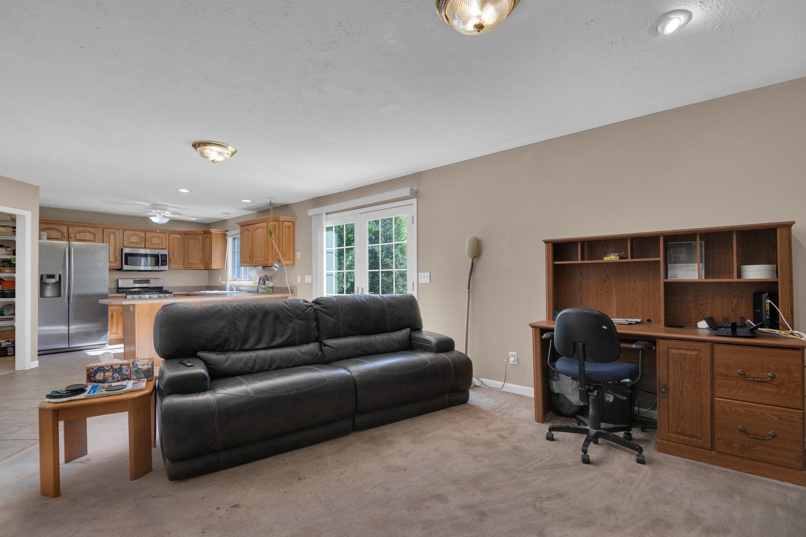 112 Sequoyah Court Southwest Poplar Grove, IL 61065 - Photo 9 of 26 a living room with furniture and a window