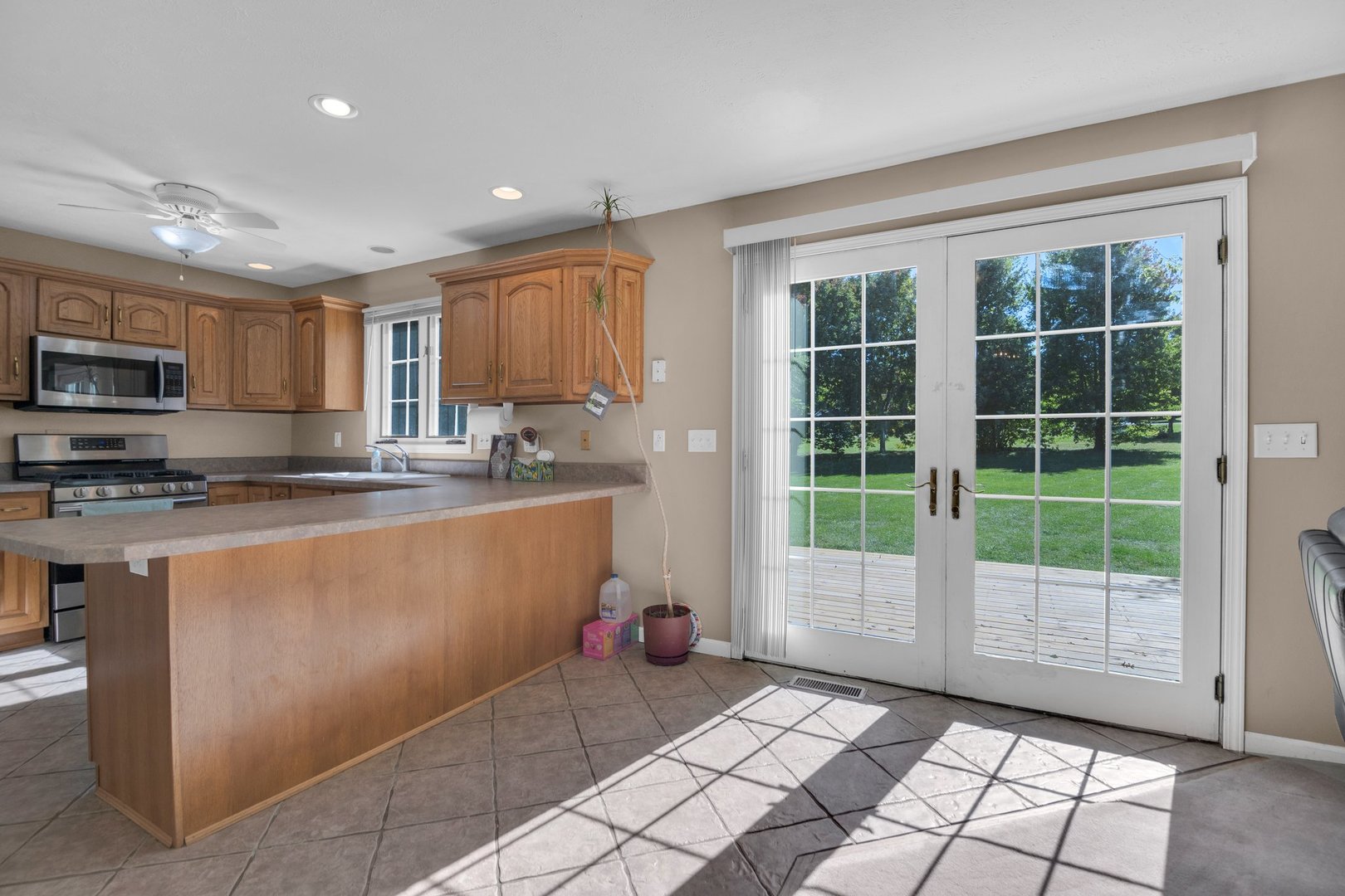 112 Sequoyah Court Southwest Poplar Grove, IL 61065 - Photo 10 of 26 a kitchen with sink a refrigerator and a counter top space