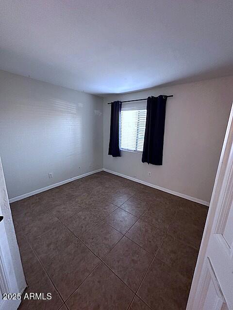 2935 North 68th Street, Unit 127 Scottsdale, AZ 85251 - Photo 16 of 25 an empty room with windows