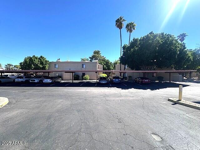 2935 North 68th Street, Unit 127 Scottsdale, AZ 85251 - Photo 23 of 25 a view of a street with cars