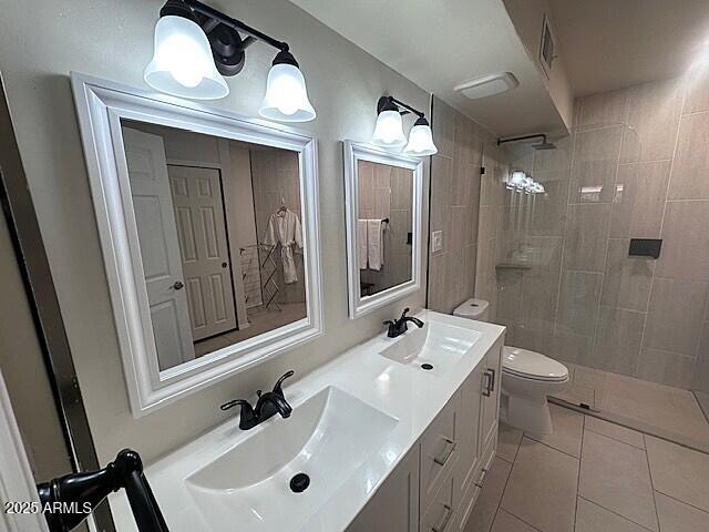 2935 North 68th Street, Unit 127 Scottsdale, AZ 85251 - Photo 5 of 25 a bathroom with a sink and a mirror