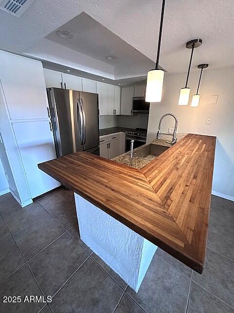 2935 North 68th Street, Unit 127 Scottsdale, AZ 85251 - Photo 10 of 25 a room with bed and wooden floor