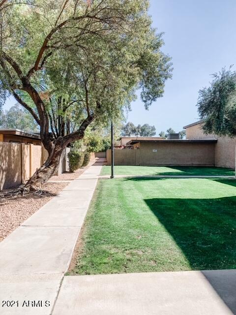 1051 South Dobson Road, Unit 168 Mesa, AZ 85202 - Photo 9 of 9 a view of swimming pool with a yard