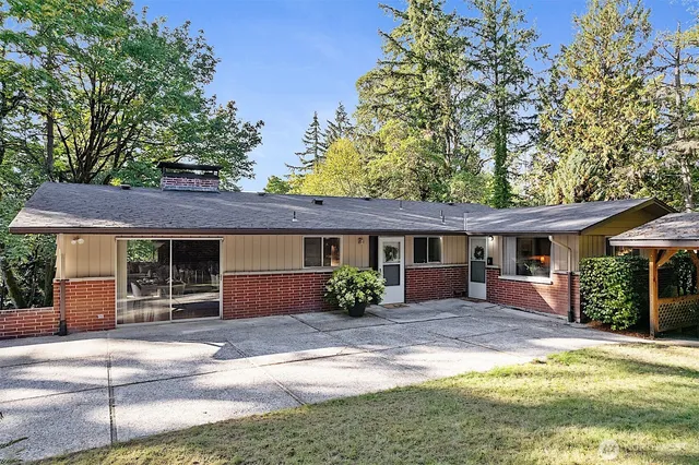 front view of a house with a yard