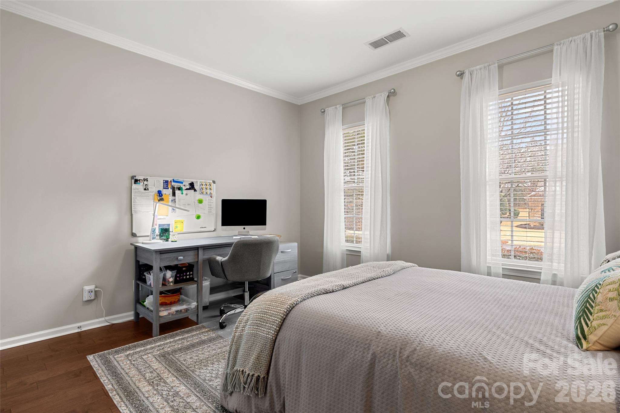 10564 Bethpage Drive Fort Mill, SC 29707 - Photo 22 of 47 a bedroom with a bed and a desk