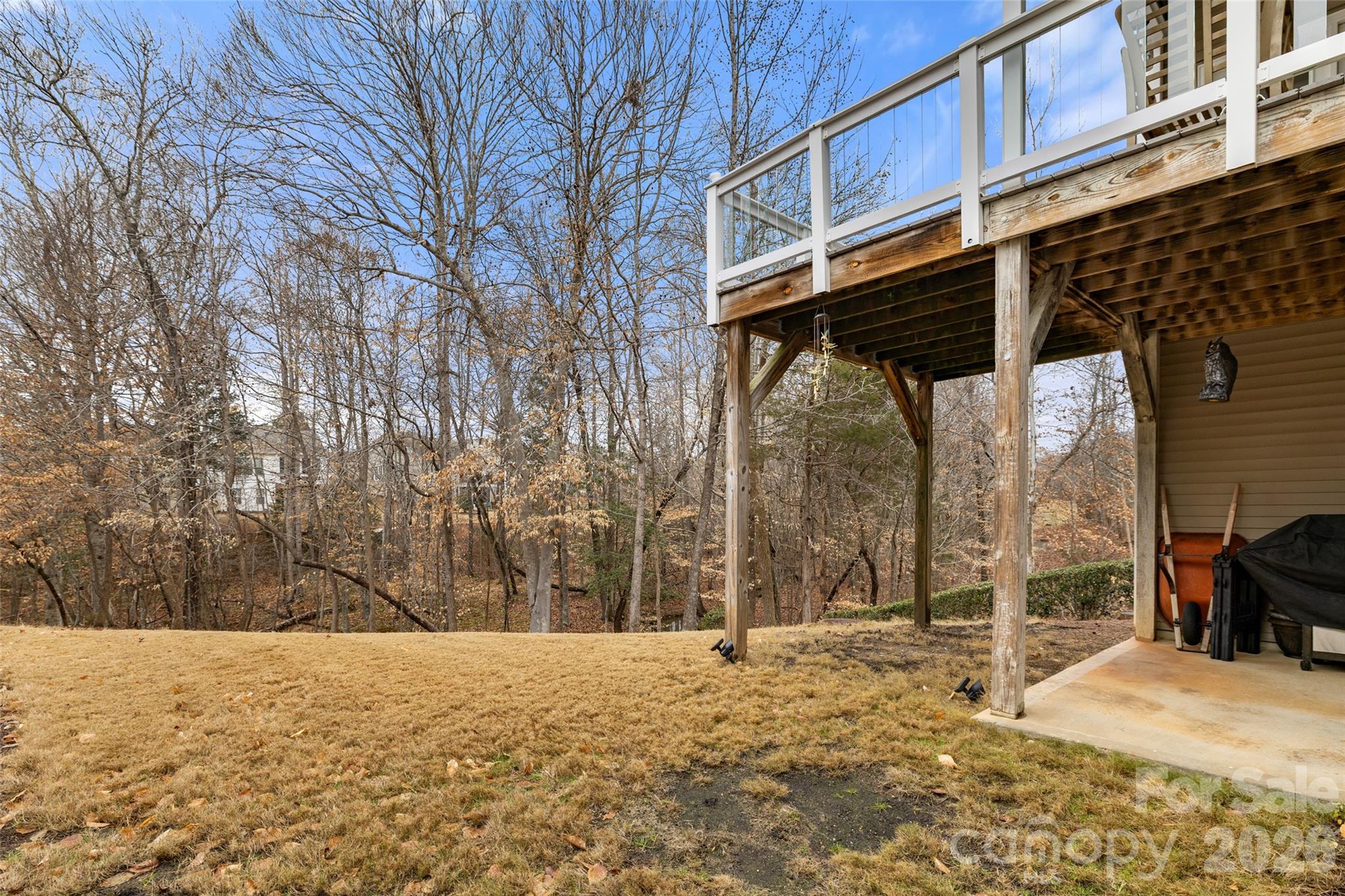 10564 Bethpage Drive Fort Mill, SC 29707 - Photo 34 of 47 a backyard of a house with large trees