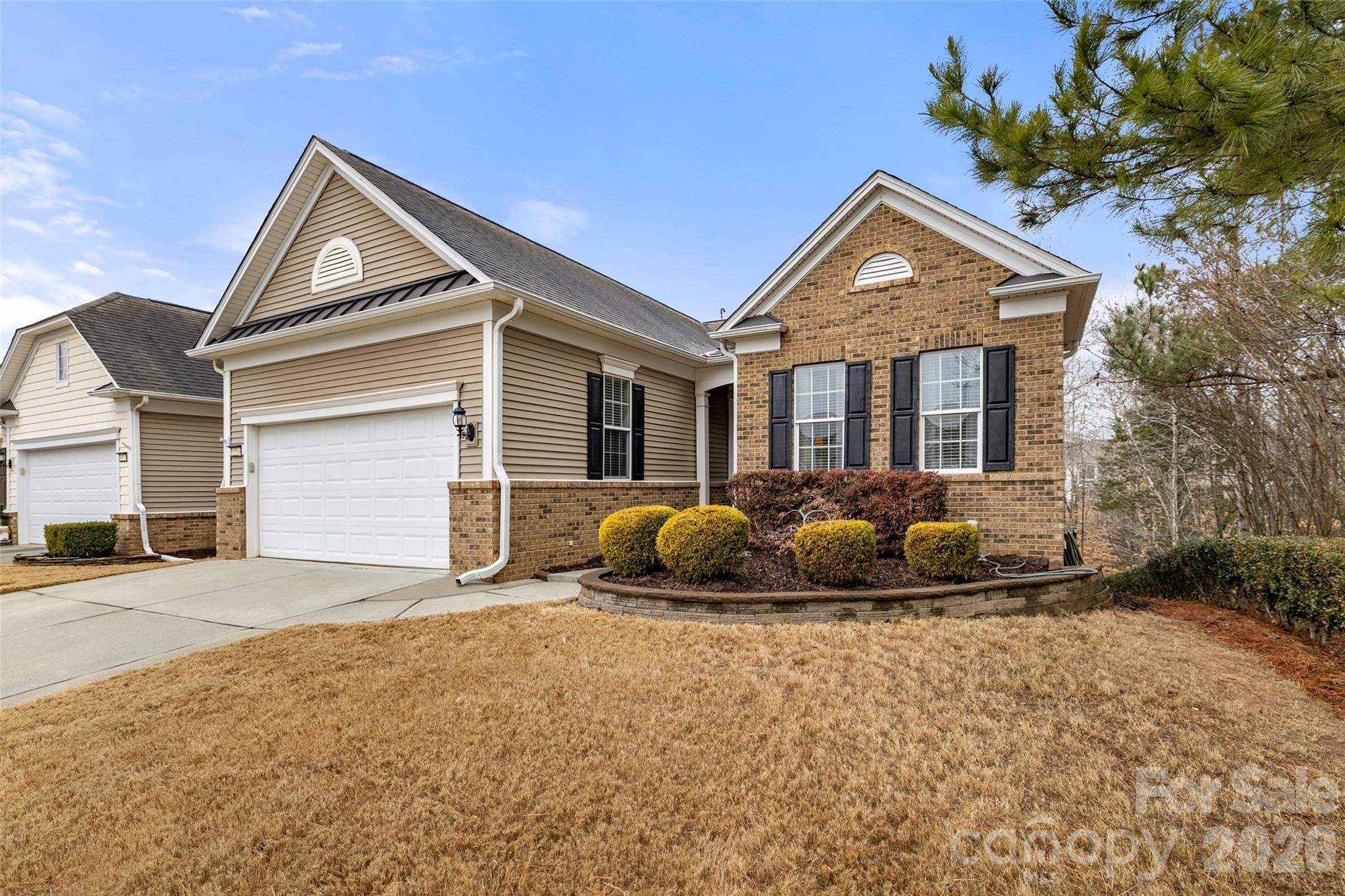 10564 Bethpage Drive Fort Mill, SC 29707 - Photo 37 of 47 a front view of a house with a yard and garage