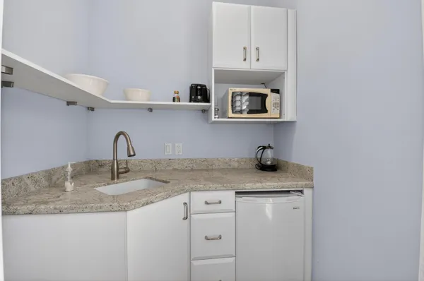 a bathroom with a shower and a toilet